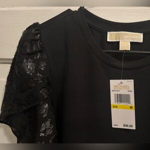 Michael Kors black t-shirt with embellished, metallic sleeves!